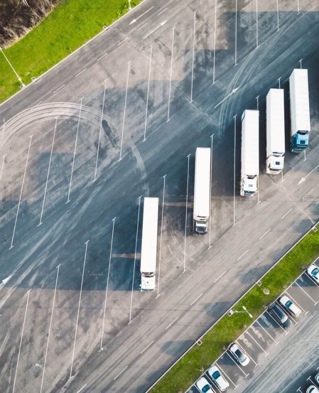 car-and-truck-parking-lot-separated-aerial-view.jpg
